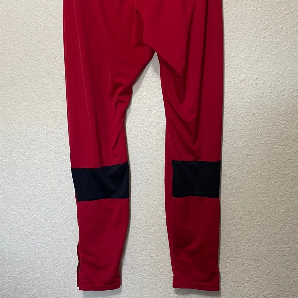 Jordan Red Warm Up Pants With Zipper At Hems. Good Condition. Size M.